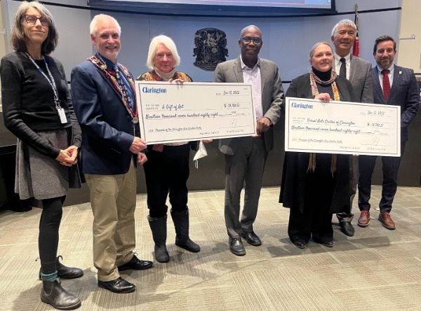 Clarington Garden Party Gala Cheque Presentation (Left to right): Councillor Margaret Zwart, Mayor Adrian Foster, A Gift of Art Director Ann Harley, Regional Councillor Granville Anderson, Visual Arts Centre of Clarington Executive Director Dionne Powlenzuk, Regional Councillor Willie Woo and Councillor Sami Elhajjeh announced more than $39,500 was raised at the Clarington Garden Party Gala to support the arts.