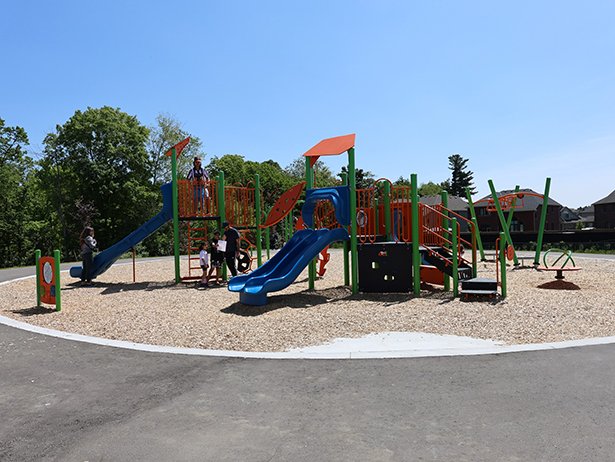 Middle Park features an all-new playground, paved walkways, shade structure, softball diamond and splash pad. 