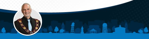 Banner with blue townscape silhouette and circular inset of Mayor Adrian Foster.