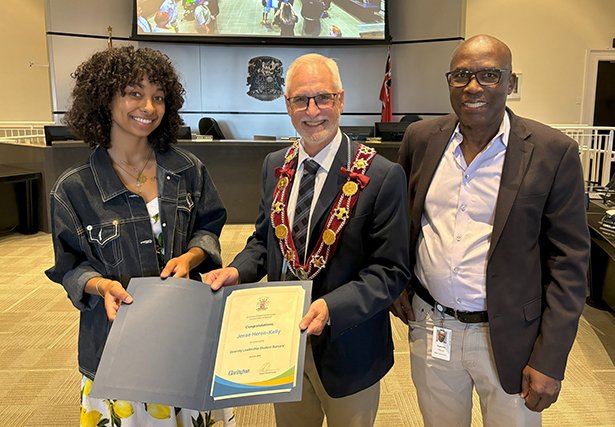 Jenae Heron-Kelly is pictured with Clarington Mayor Adrian Foster and Regional Councillor Granville Anderson.