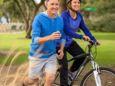 Healthy older couple exercising