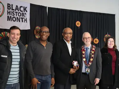 From left: Councillor Sami Elhajjeh, Councillor Granville Anderson, Mayor’s Challenge Coin recipient Hamlin Grange, Clarington Mayor Adrian Foster, and Councillor Traill.
