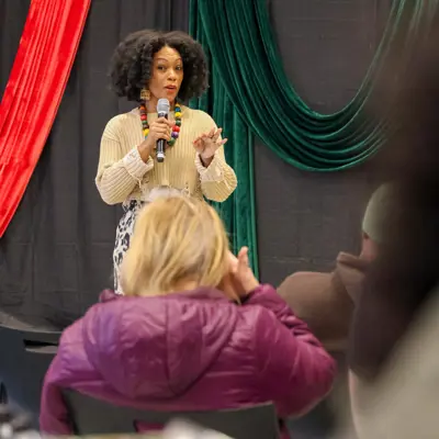 Tracy J delivers a spoken word performance at the 2026 Black Vendor Village.